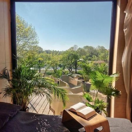 Riverfront Cabins In The Garden Posen Exterior foto