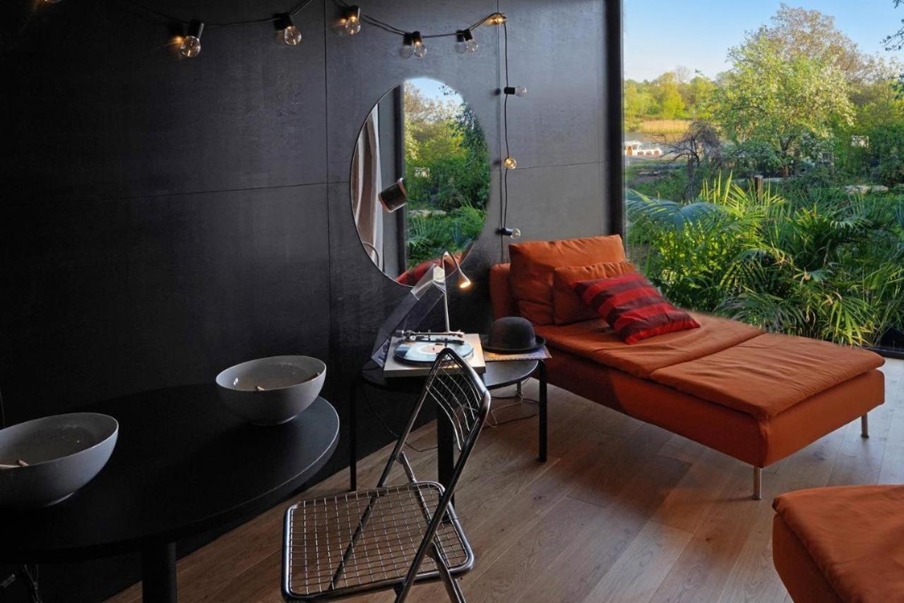 Riverfront Cabins In The Garden Posen Exterior foto