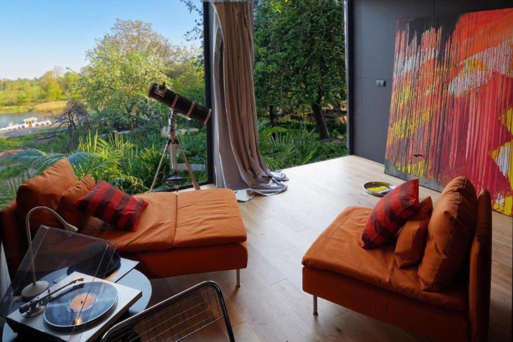 Riverfront Cabins In The Garden Posen Exterior foto