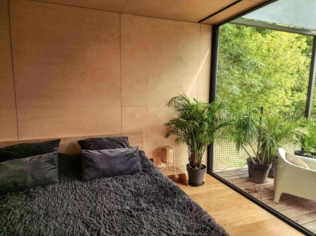 Riverfront Cabins In The Garden Posen Exterior foto